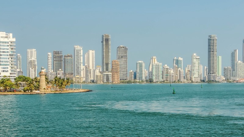 Colombia, Cartagena, Castillogrande Lighthouse and Bocagrande's Skyline